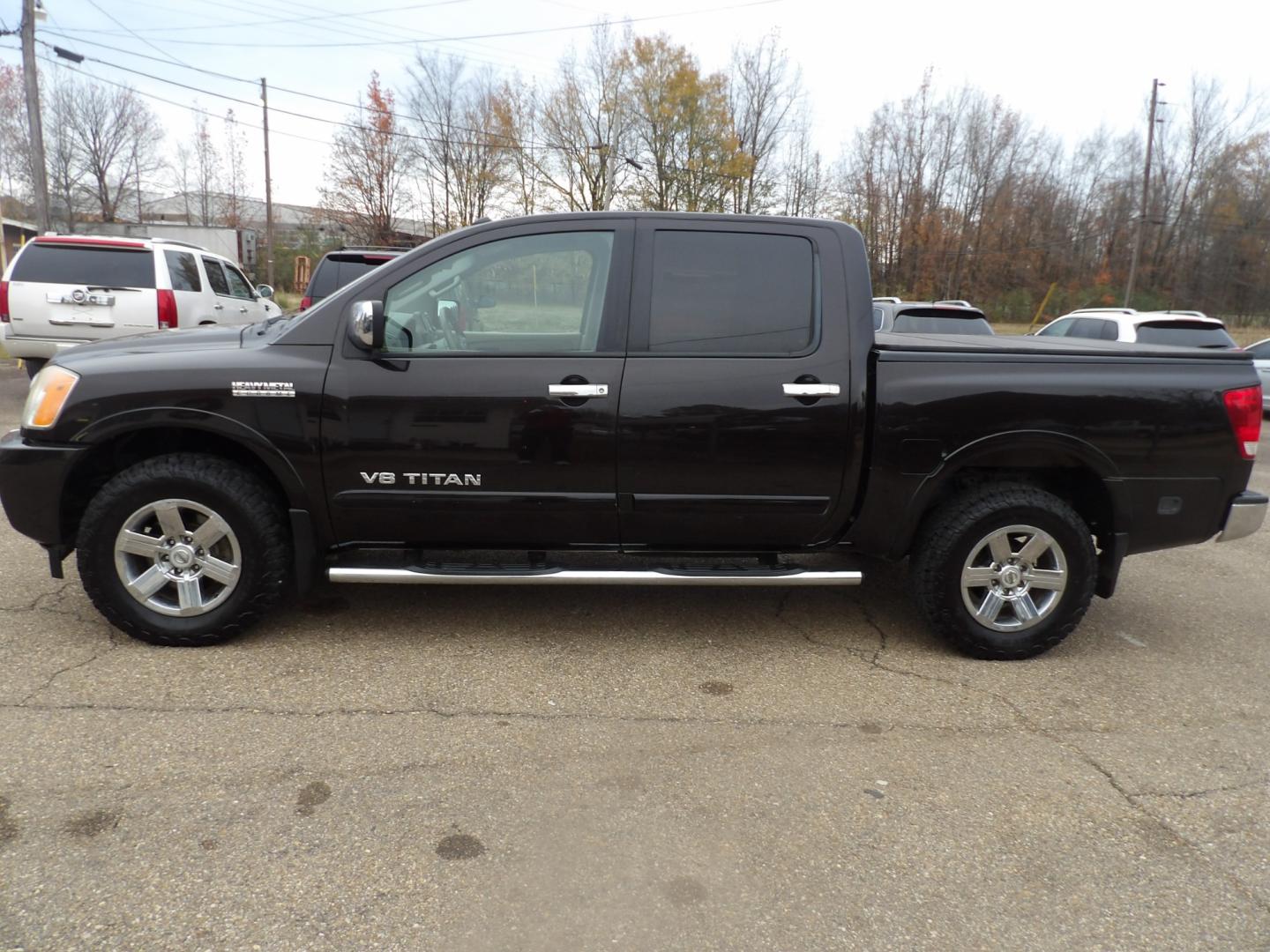 2015 Nissan Titan S Crew Cab 4WD (1N6BA0EC7FN) with an 5.6L V8 DOHC 32V FFV engine, 5-Speed Automatic transmission, located at 401 First NE, Bearden, AR, 71720, (870) 687-3414, 33.726528, -92.611519 - Photo#1